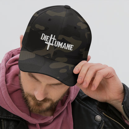 DieHumane hat. Male model. Camo baseball cap with white stitching, embroidery